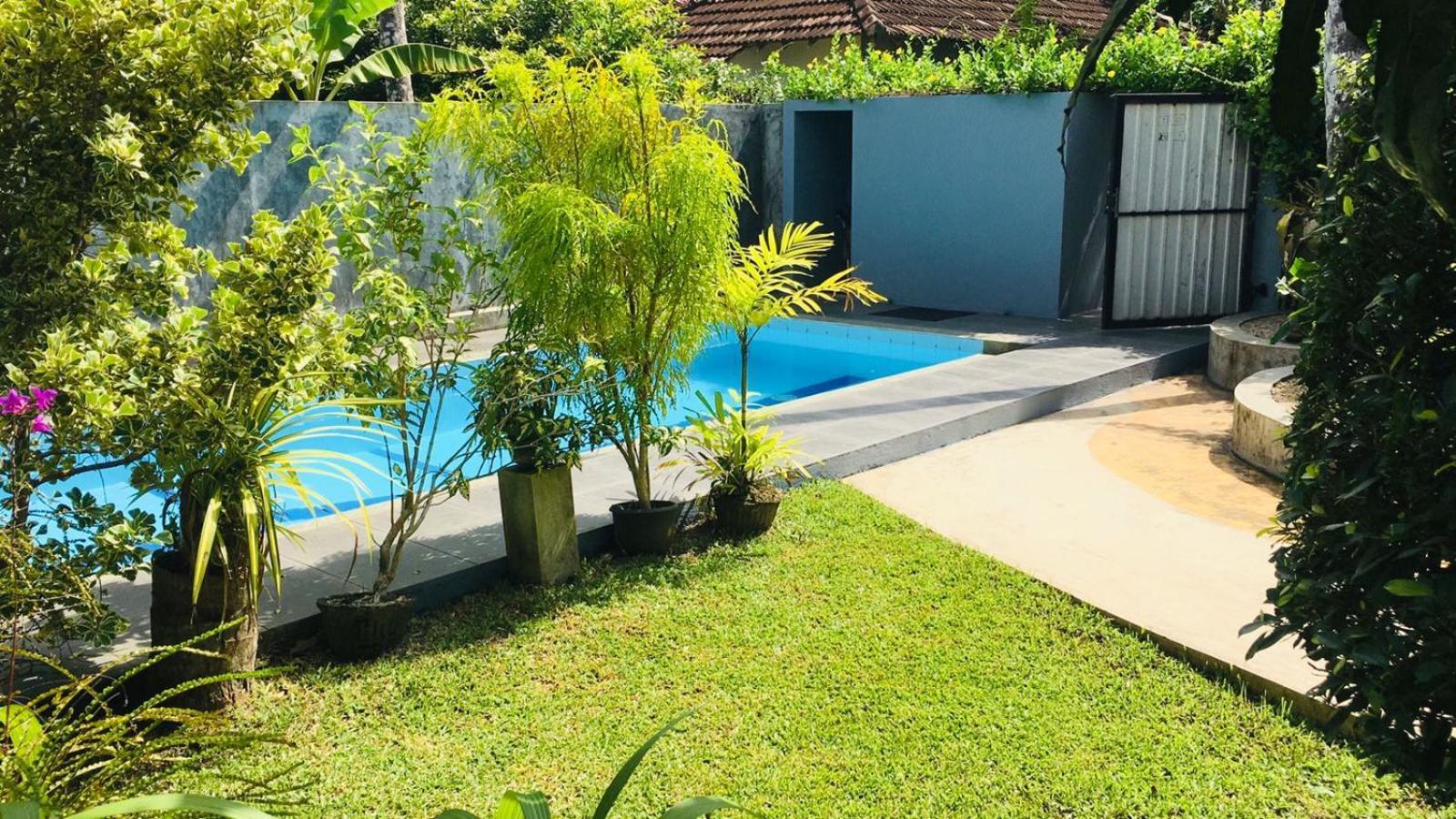 Om Villa Hikkaduwa Exterior photo